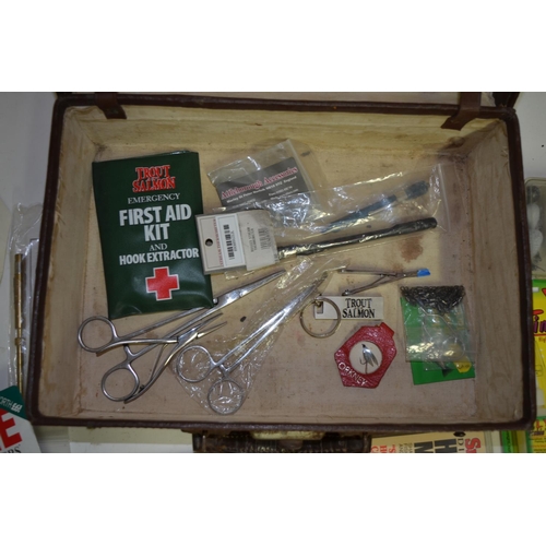 92 - A collection of mostly fishing related tools and accessories, includes forceps, an Orvis knot tyer, ... 