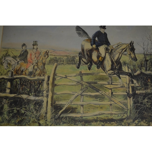 100 - A large framed print depicting A Squires 2nd Horseman jumping that last gate at the end of a hunt, c... 