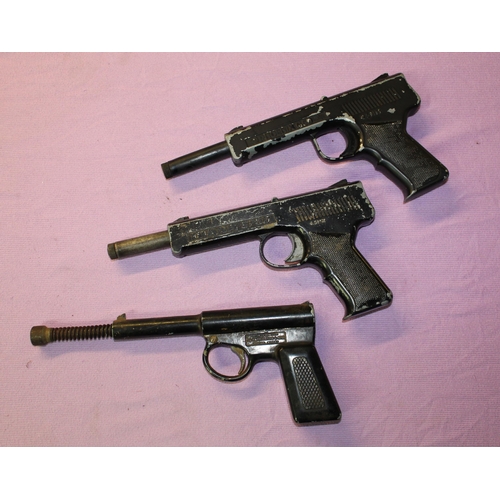 148 - 3 vintage pop out air pistols:
Phoenix G50 .177, working.
Diana SP50 .177, working.
Early T J Harrin... 