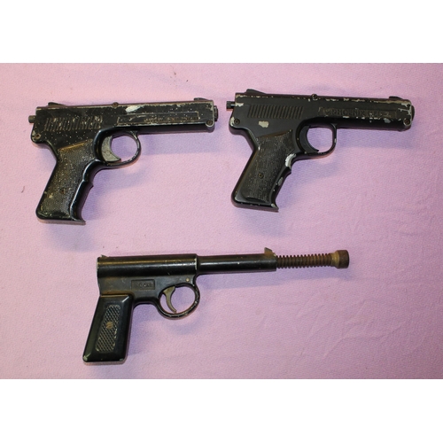 148 - 3 vintage pop out air pistols:
Phoenix G50 .177, working.
Diana SP50 .177, working.
Early T J Harrin... 