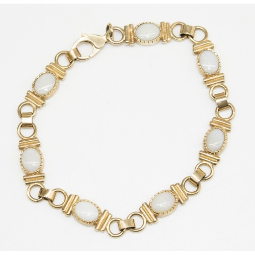 7 - 9ct yellow gold chain link bracelet set with opals, stamped 9ct, L20cm, 14.6g