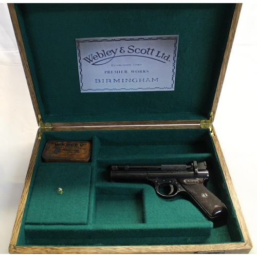 150 - Webley Premier air pistol with Webley oil tin and pellet box (empty), in wooden case with green lini... 