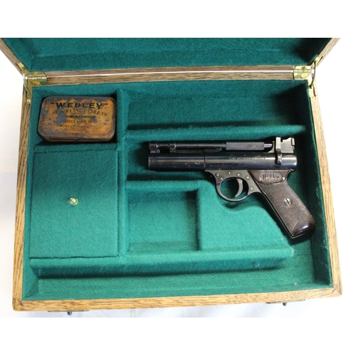 150 - Webley Premier air pistol with Webley oil tin and pellet box (empty), in wooden case with green lini... 