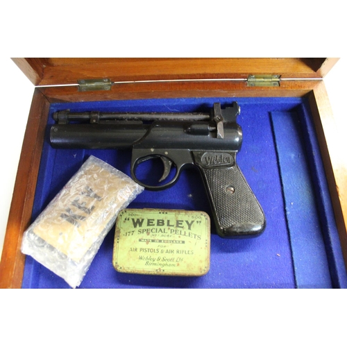 152 - Webley Junior MK II .177 air pistol with pellet box filled with pellets and darts, in lockable woode... 