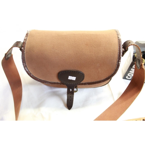 262 - Canvas and leather cartridge bag, leather cartridge belt, pair of Alpha 7 shooting glasses