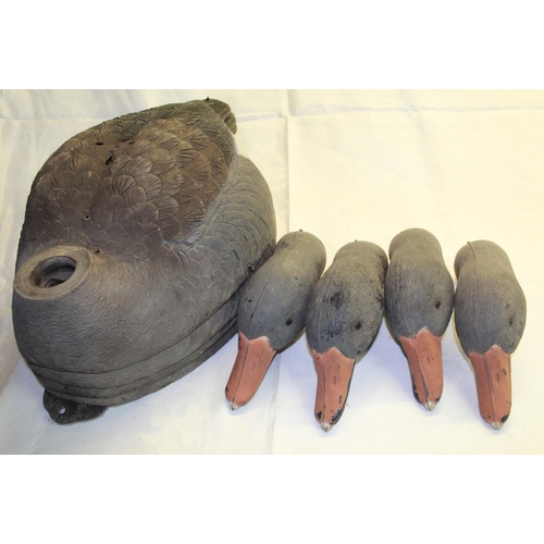 264 - Set of Canada goose decoys, four bodies and three heads in camouflage carrying bag