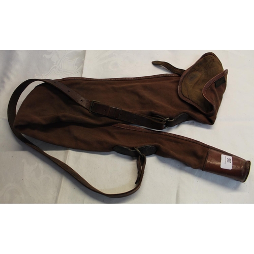 266 - Brady canvas gun slip with leather carrying strap