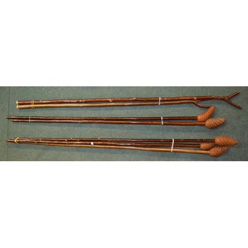 110 - 5 pinecone topped walking sticks, 4 cherry, 1 ash, overall length approx 140cm and 2 thumbstick walk... 