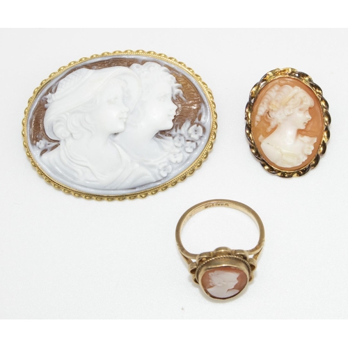 25 - Cameo brooch of two children in profile on an 18ct yellow gold mount, stamped 750, a 9ct gold cameo ... 