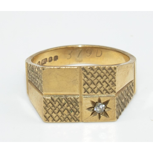 26 - 9ct yellow gold rectangular faced signet ring, with inlaid diamond detail, stamped 375, size V, 9.2g