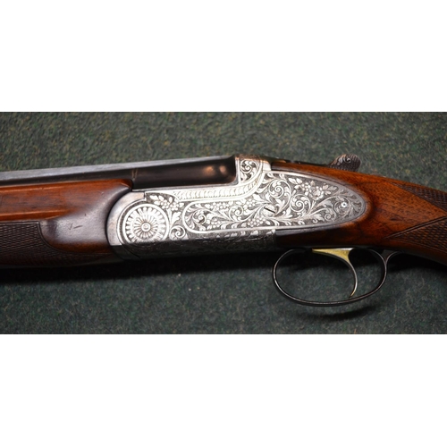 341 - Sabatti over and under twenty gauge ejecting single trigger shotgun SN 24012, barrel length 27.5