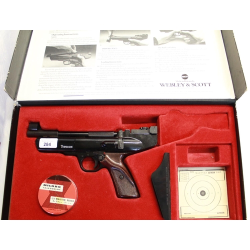 284 - Boxed Webley Typhoon .177 over lever air pistol including original targets and pellets (box in good ... 