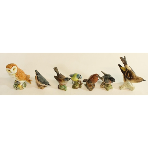 588 - Collection of Beswick porcelain bird models incl. Chaffinch, Owl, Whitethroat etc. and a Goebel Bram... 