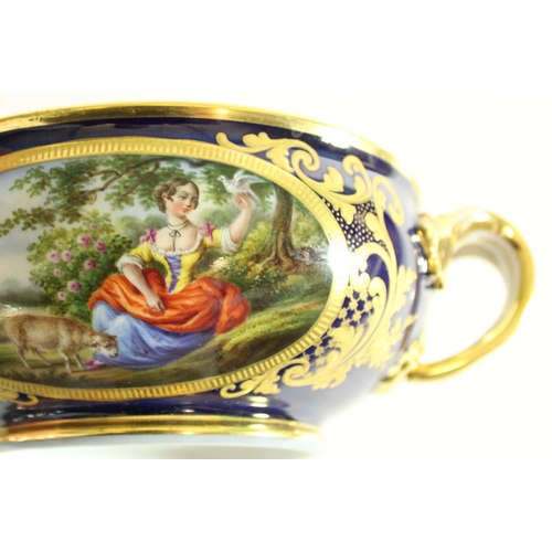 604 - C19th porcelain two handled Ecuelle bowl in the manner of Sevres, gilt decorated with scrolls on cob... 