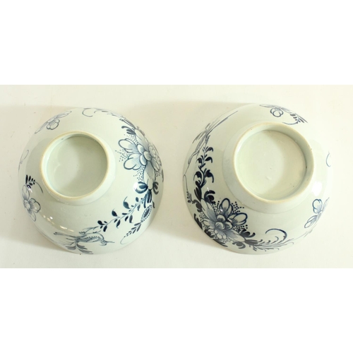 605 - Near pair of C18th English blue and white porcelain slop bowls painted in a Bird on a Branch pattern... 