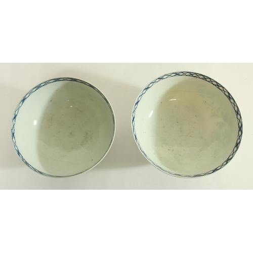 605 - Near pair of C18th English blue and white porcelain slop bowls painted in a Bird on a Branch pattern... 