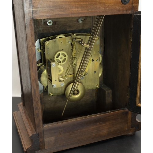 394 - Early C20th oak cased mantel clock, arched glazed door enclosing silvered and engraved arched Arabic... 