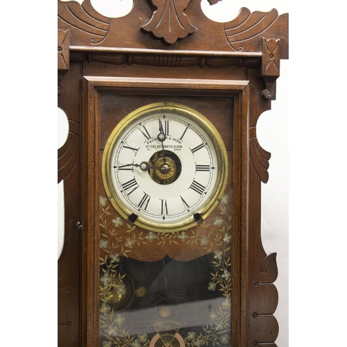 399 - Retailed by Fattorini & Sons' patent Automatic Alarm early C20th mahogany cased mantel clock, carved... 