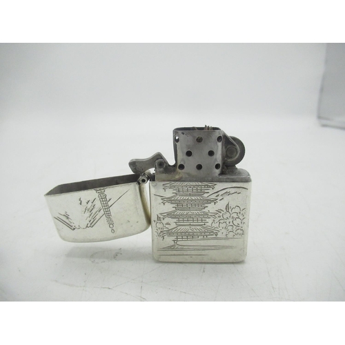 78 - Silver lighter with Japanese design, marked 