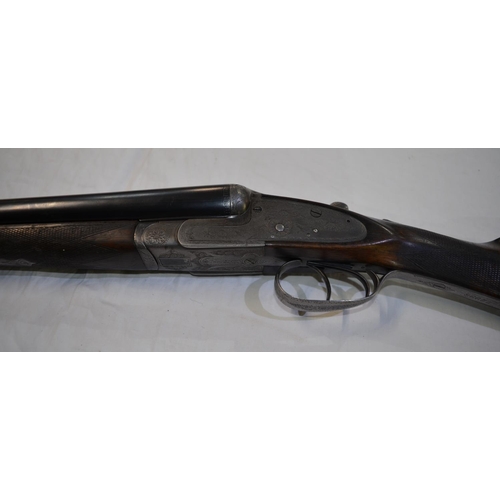 377 - A Midland Gun Co 12 gauge box lock side by side double barrel shot gun. Double trigger, non ejector ... 