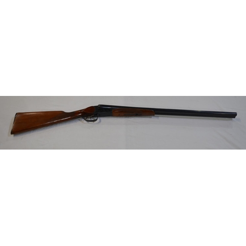 379 - A Baikal 12 gauge side lock side by side double barrel shot gun. Double trigger, non ejector. Serial... 