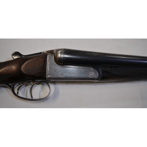 382 - A Midland Gun Co 12 gauge box lock side by side double barrel shot gun. Double trigger, non ejector.... 