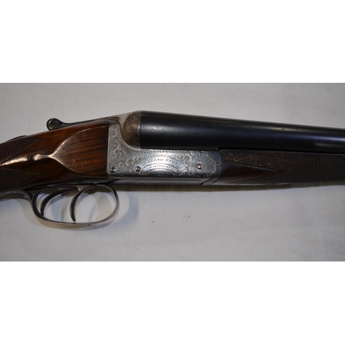 387 - A William Evans 12 gauge box lock side by side double barrel shot gun. Double trigger, non ejector. ... 