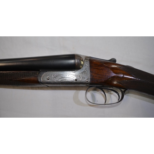 387 - A William Evans 12 gauge box lock side by side double barrel shot gun. Double trigger, non ejector. ... 