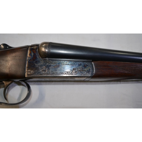 389 - A AYA 16 gauge box lock side by side double barrel shot gun. Double trigger, ejector. Serial No 3564... 