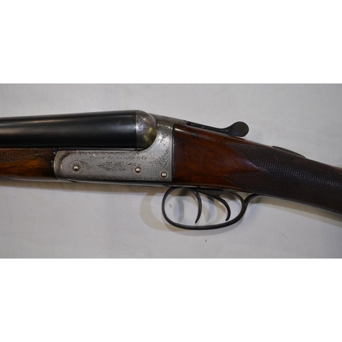 390 - A Chas Osbourne 12 gauge box lock side by side double barrel shot gun. Double trigger, non ejector. ... 