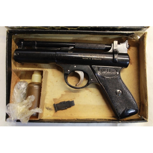 312 - Boxed Webley senior over leaver .22 air pistol SN:733 with spare pellets and a spare rear sight 1.5L... 