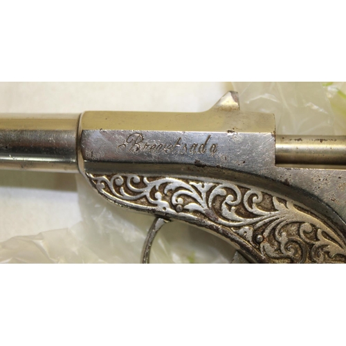 323 - Unusual Breversada bolt action .177 air pistol with scroll pattern above the trigger made in Italy i... 