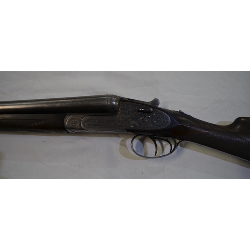 392 - A Laurona 12 gauge side lock side by side double barrel shot gun. Double trigger with ejector. Seria... 