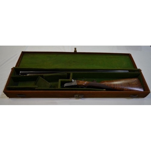 427 - Cased William Powell and Son box lock 20 gauge side by side double barrel shot gun. Double trigger e... 