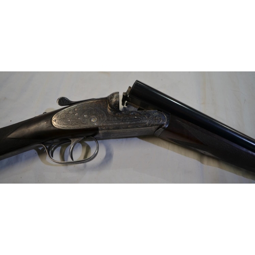 430 - Cased AYA No2 Round Body side lock 12 gauge side by side double barrel shot gun. Double trigger with... 