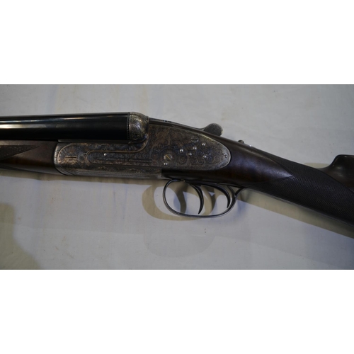 430 - Cased AYA No2 Round Body side lock 12 gauge side by side double barrel shot gun. Double trigger with... 