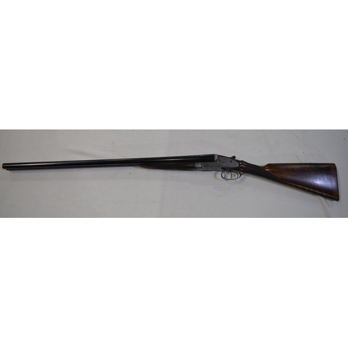 433 - A cased H.J.Hussey side lock 12 gauge side by side double barrel shot gun. Double trigger with eject... 