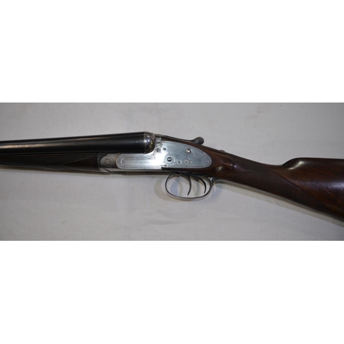 434 - A cased Thomas Bland side lock 12 gauge side by side double barrel shot gun. Double trigger with eje... 