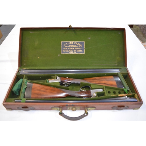 436 - A cased pair of William Evans box lock 12 gauge side by side double barrel shot guns. Double trigger... 