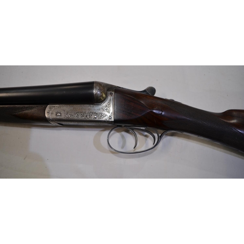 436 - A cased pair of William Evans box lock 12 gauge side by side double barrel shot guns. Double trigger... 