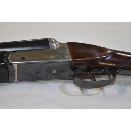 437 - An Isaac Hollis box lock 28 gauge side by side double barrel shot gun. Double trigger, ejector. Seri... 