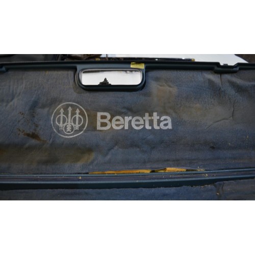 432 - A cased Beretta Sporting 687 EELL 12 gauge over/under double barrel shot gun with chokes. Single tri... 