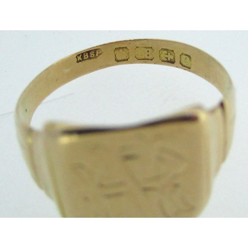 41 - 18ct yellow gold signet ring with shield face, engraved with initial NR, stamped 18, size R1/2, 3.6g