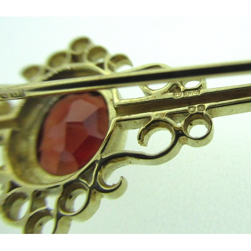 49 - 9ct yellow gold bar brooch set with red stone, stamped 375, and a yellow metal bar brooch set with a... 