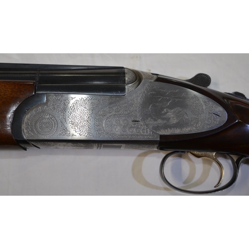 326 - A Rizzini 12 gauge O/U double barrelled shot gun. Serial 57956, with multi-chokes. Barrell length 28... 