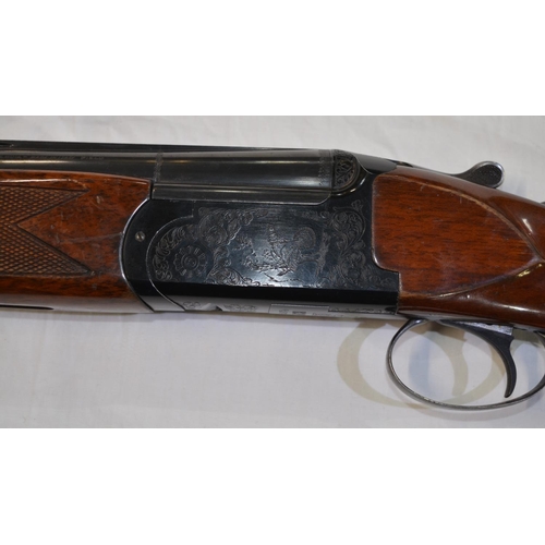 327 - A Franchi 12g O/U shotgun with single trigger and ejectors, 28' barrel, overall length 44.5'. Serial... 