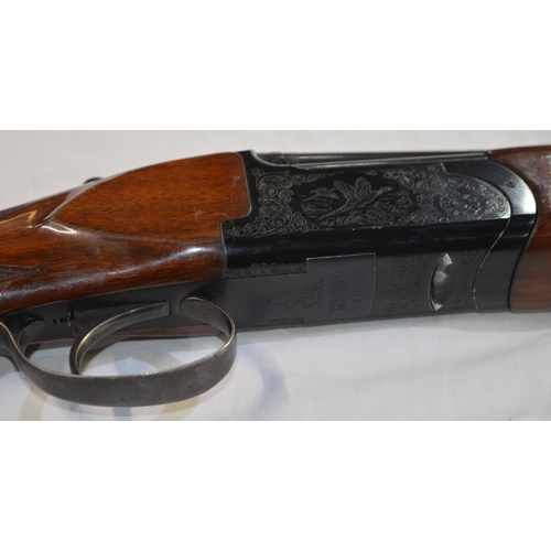 327 - A Franchi 12g O/U shotgun with single trigger and ejectors, 28' barrel, overall length 44.5'. Serial... 