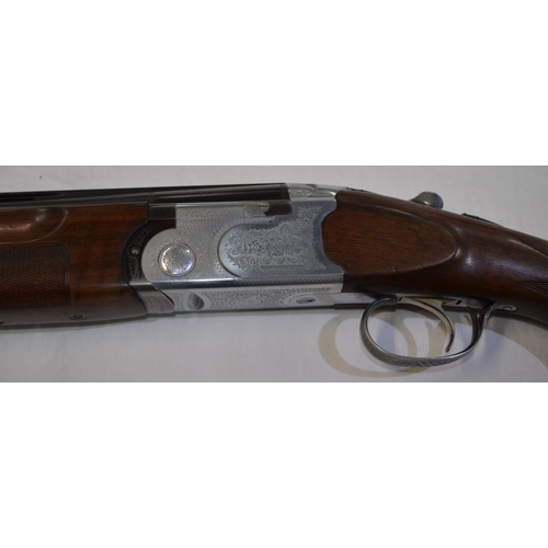 328 - A Beretta 12G single trigger O/U with ejectors, serial number E86337B. 28'barrel, overall 45.5'. Sho... 