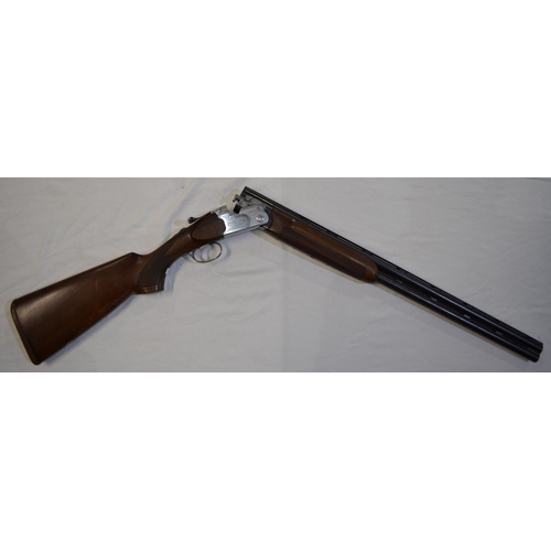 328 - A Beretta 12G single trigger O/U with ejectors, serial number E86337B. 28'barrel, overall 45.5'. Sho... 