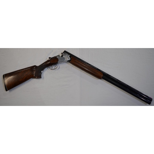 329 - A Beretta model 682 12 gauge O/U double barreled shot gun. Serial E43794B. Barrell length 28'. Overa... 